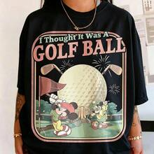 Authorized By Disney. Mickey Mouse Presents Mickey Playing Golf In American Retro Illustration Style, Mistakenly Thinking Epcot's Globe Is A Golf Ball, With The Slogan 'I Thought It Was A GOLF BALL', A Group Of Elegant Ladies And Ladies' Cotton T-Shirts. The Fabric Is Soft, Comfortable And Breathable, Suitable For Daily Wear, Shopping, Travel, Parties And Home Use. Men's And Women's Clothing, As Well As Lovers' Clothing, Are Also Suitable As Exquisite Gifts. Every Woman Should Have One. - màu đen - Xem 1
