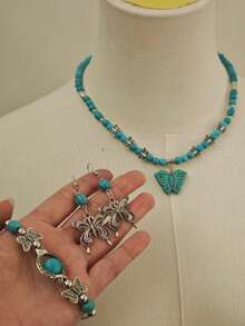 1 Set de joyería bohemia vintage con efecto desgastado y turquesa falsa, que incluye collar con colgante de mariposa, pulsera y aretes con cuentas, versátil para vacaciones, uso diario, fiestas, festivales de música, playa de verano, regalo para amigos, familia, parejas y mujeres - Turquesa - Ver 4