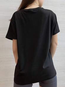 Basic T-Shirt With A Comfortable Round Neck, Fun And Stylish Print. - Black - View 2