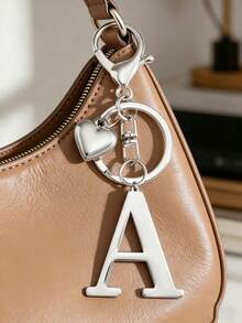 Premium Fashion Silver Metal Heart-Shaped Letter Keychain, A-Z 3D Letter Pendant, Stylish Alloy Keychain, Backpack Charm Car Keychain, Classic Minimalist Keychain For Women's Daily Use, Decorative Accessory, Perfect Gift For Friends, Family, Couples, Girlfriend, Special Occasions, Mother's Day - Multicolor - View 1