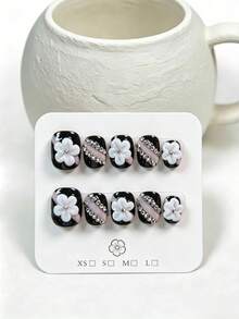 10 Pieces Of Handcrafted Short Square-Round Press-On False Nails (Wearable Nail Art Accessories). These Nails Feature A Y2K Millennium Cool Girl Style, With Hand-Painted 3D White Small Flowers On A Black Base, Paired With Cherry Blossom Pink Diagonal Stripes And Full-Diamond Diagonal Strips. Suitable For Parties, Weddings And Daily Wear, The Set Includes Nail Application Tools. It's A Perfect Gift For Women And Girls. - Black - View 2