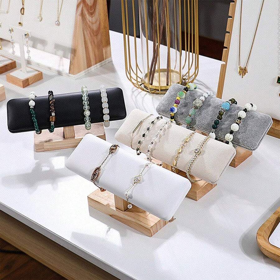 Giá trưng bày đồng hồ đeo tay, đế trưng bày bằng gỗ, giá đỡ vòng tay hình chữ T, giá đựng trang sức giả da lộn, giá treo mặt dây chuyền, giá treo lắc chân, giá trưng bày vòng tay, dây buộc tóc, băng đô dùng trong gia đình/bán lẻ, màu be da lộn. - Giá đỡ vòng đeo tay một lớp bằng gỗ - Xem 1