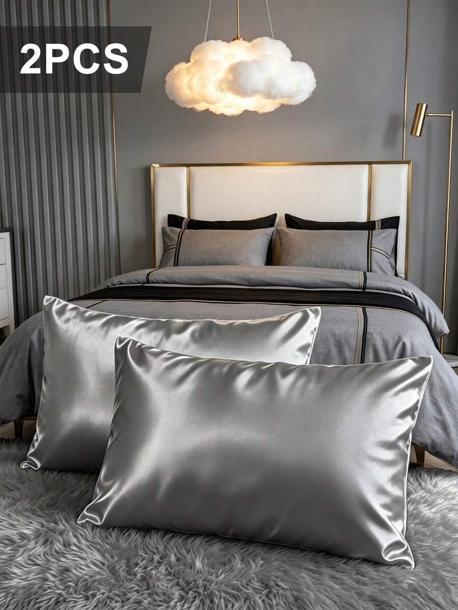 2件装奢华缎面枕套,柔软透气,抗皱,灰色,呵护秀发和肌肤,提升睡眠质量。仅含枕套,不含枕芯,丝滑柔顺,超柔软透气,可机洗。是馈赠亲友和旅行的理想之选。信封式开口,凉爽舒适,奢华寝具枕套,超柔软酒店枕套,适用于标准尺寸、加大尺寸和特大尺寸床。 - 灰色 - 查看 1