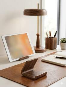 Fabriqué en bois massif de haute qualité avec une texture douce et délicate. La structure en forme de U offre un support stable pour le téléphone, empêchant les glissements et protégeant l'appareil tout en libérant vos mains. - Plusieurs styles - Voir 9