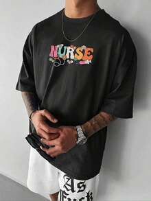 The Print Features The Word NURSE With Colorful Medical Elements Such As A Stethoscope, Syringe, Pills, And Flowers, Symbolizing Dedication, Care, And Positive Energy Towards The Nursing Profession. This Men's T-Shirt Is Made Of 100% Cotton, Is Casual And Comfortable, Ideal For Everyday Wear, And Makes An Inspirational Gift. - 黑色 - 查看 1