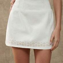 guangzhougaolangshangmao  Falda mini acampanada de talle alto 100% de algodón de pana con bordado floral, para otoño, invierno, vestimenta occidental, casual y linda, estilo bohemio, para conciertos country - Albaricoque - Ver 1