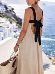 Holidaya Vestido largo de mujer de nuevo estilo de vacaciones con contraste de color, tirantes finos, espalda descubierta y lazo. Está hecho de tela fluida, con tirantes anchos de color contrastante, diseño frontal simple y diseño de lazo en la espalda descubierta, con una sensación suave y relajada adecuada para vacaciones y salidas casuales. Pertenece a la categoría versátil de vestidos largos de estilo de vacaciones con contraste de color, vestidos maxi con espalda descubierta y tirantes anchos, vestidos de vacaciones sin tirantes y vestidos sueltos con lazo. - Caqui - Ver 4