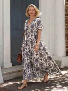 Vestido de manga corta con estampado floral y abotonadura sencilla para mujeres de edad media y mayores - Negro - Ver 2