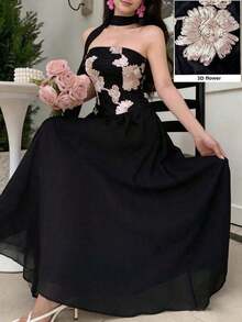 Vestido negro con escote sin tirantes y lazo, con bordado floral elegante de gasa - Negro - Ver 1