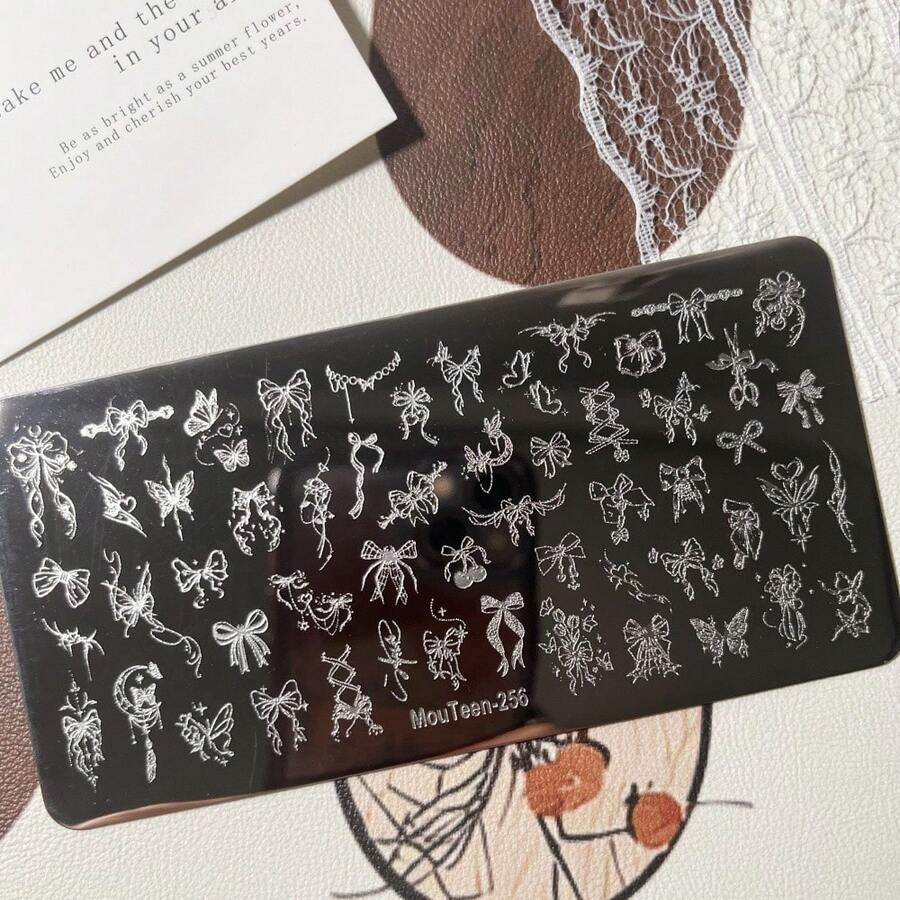 新款少女美甲印花板，柔美蝴蝶结和链条图案，MouTeen256