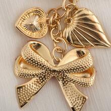 Llavero con colgante de corazón con strass en forma de lazo rosa, accesorio brillante y femenino ideal como regalo para fiestas y cumpleaños - Multicolor - Ver 8