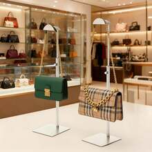 An Elegant, Height-Adjustable Handbag Display Rack Made Of Stainless Steel; Features A Handbag Holder, Hat And Jewelry Rack, And Single-Pouch Jewelry Display; Ideal For Closets And Boutiques; Easy To Install And Disassemble; - / - View 3