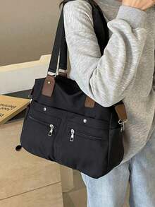 Este nuevo bolso cruzado de lona de unicolor, de moda y clásico, tiene una gran capacidad, múltiples bolsillos y un diseño de asa bicolor, lo que lo hace muy adecuado para salidas al campus. Esta mochila de estilo universitario tiene un gran espacio, es impermeable, ligera y portátil, con un estilo casual clásico adecuado para mujeres jóvenes. - Negro - Ver 6