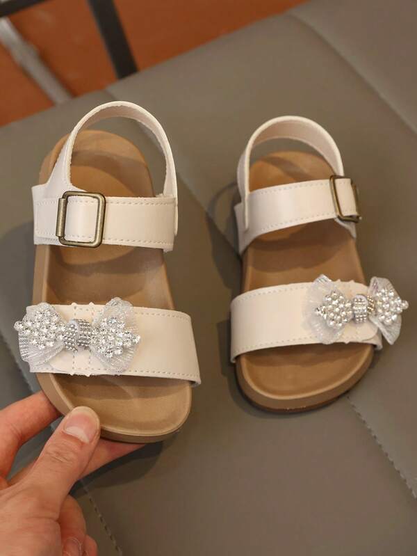 1 Pair Girls' Summer Minimalist Casual Sandals, Mesh Rhinestone Bow Decor, Skin-Friendly Soft PU Material, Non-Slip Wear-Resistant Soft Sole, Open Toe Round Toe Double Buckle Backstrap Design, Flat Heel Fresh Gentle Style, Versatile Comfortable Sandals For Daily School, Outdoor Play, Home Outings, Holiday Performances