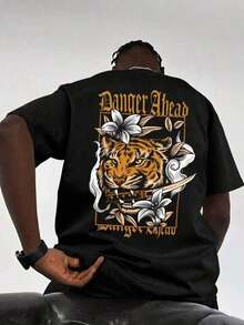 Camiseta Oversized para Hombre Fractyr, Diseño Gráfico "Danger Ahead" Estilo Tatuaje Floral de Tigre, Camiseta Casual de Estilo Gótico Urbano, Camiseta de Manga Corta con Cuello Redondo y Tacto Suave para un Estilo Urbano y Atrevido. - Negro - Ver 2