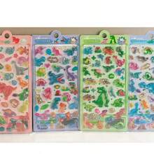Bộ sticker xốp 3D hình thế giới khủng long đầy màu sắc, rất cần thiết cho nhật ký của trẻ em. Những sticker bóng bẩy này có hình các sinh vật thời tiền sử theo phong cách hoạt hình như T-Rex, hoàn hảo để trẻ em trang trí nhật ký của mình. - Nhiều màu - Xem 1