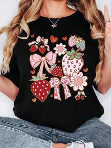 Camiseta de manga corta para mujer con apliques de flores de fresa y lazo - Blusa suave y elástica de cuello redondo, top casual de corte regular en línea H, lavable aáquina, ropa de mujer para primavera, verano y otoño - Negro - Ver 6