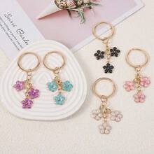 1pc Cute Enamel Three Flower Keychain, Sweet Gold Tone Alloy Floral Pendant Key Ring, Aesthetic Bag Charm For Purse, Backpack & Earbuds Case, Girly Car Key Accessories Gift - A - View 3
