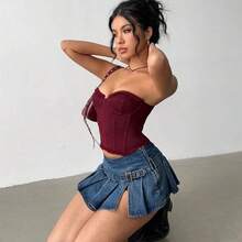 guang zhou mi qian shang mao  Minifalda de jeans plisada de talle ultra bajo sexy para mujer - Azul lavado medio - Ver 4