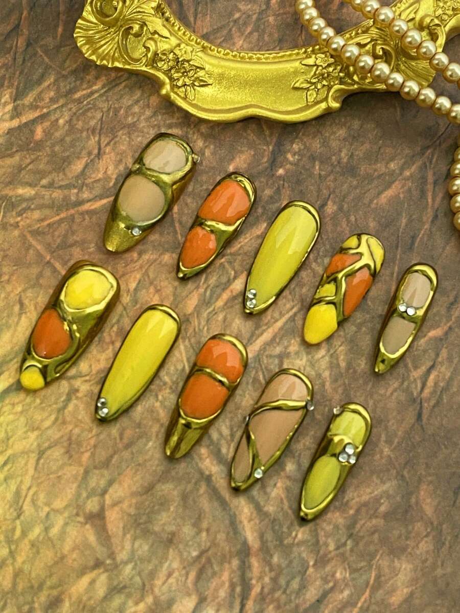 10pcs Women's Almond-Shaped Press-On Nails, Acrylic Fake Nails With Metallic Gold Line Design And Mini Rhinestones, Warm Yellow-Orange Color Block Retro Metallic Frame, Handmade Vintage Fashion Nail Stickers, Nail Art Supplies