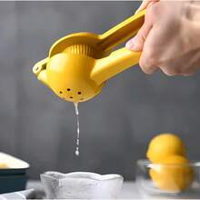 A stainless steel manual lemon juicer, manual lemon juicer, fruit and vegetable juicer, kitchen fruit and vegetable juicing tool, with lid. - Gelb - Übersicht 3
