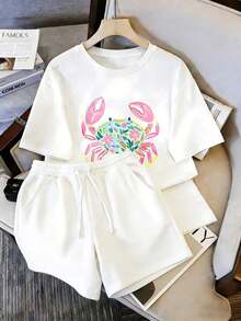 Women's Two-Piece Set, T-Shirt And Shorts, Featuring A Fresh Watercolor Crab Print On The Front Of The T-Shirt, A Blue And Pink Crab Body With Large Pink Claws And Colorful Flower And Leaf Elements, Bright And Cheerful Colors, Casual Everyday Style, Suitable For Wearing On Labor Day And Mother's Day - 白色 - 查看 1