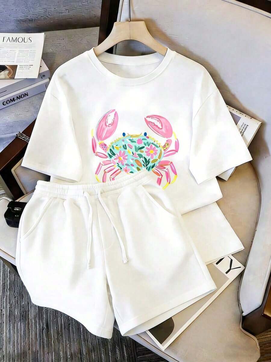 Women's Two-Piece Set, T-Shirt And Shorts, Featuring A Fresh Watercolor Crab Print On The Front Of The T-Shirt, A Blue And Pink Crab Body With Large Pink Claws And Colorful Flower And Leaf Elements, Bright And Cheerful Colors, Casual Everyday Style, Suitable For Wearing On Labor Day And Mother's Day - 白色 - 查看 1
