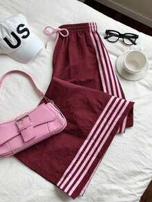 2026 Nuevo Pantalones deportivos casuales de mujer con raya lateral amarilla, cintura elástica y corte holgado, adecuados para primavera/verano, Navidad, Y2K, salidas casuales de Año Nuevo - Burdeos - Ver 5
