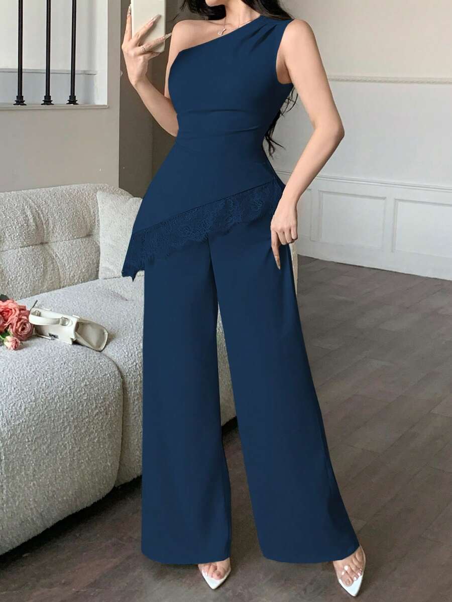 abyoxi Bộ đồ nữ màu xanh hải quân gồm áo không tay vạt lệch, phối ren, nhún eo và quần ống rộng, gợi cảm và thanh lịch, phù hợp cho đi làm, dạo phố, dự tiệc tối, hẹn hò, tiệc tùng, ngày Valentine. Áo ôm sát kết hợp với quần dài là trang phục mùa hè hoàn hảo. - Màu xanh hải quân - Xem 1