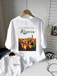 T-Shirt With An Architectural Pattern Of The Old City Of Algeria, In Retro Poster Style, Casual Men's Short-Sleeved Shirt Made Of Pure Cotton, Artistic Style, Ideal For Travel And Holidays, Comfortable And Versatile, Suitable For Leisure, Outdoor Sports And Summer Wear. - 魏斯 - 查看 1