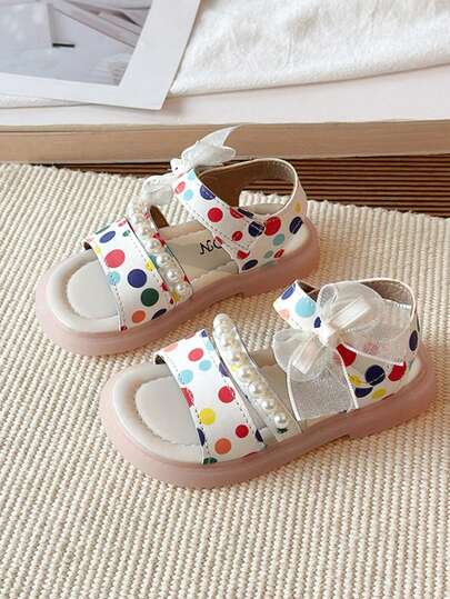 Giày sandal chấm bi nhiều màu sắc đính ngọc trai cho bé gái, giày công chúa thắt nơ mùa hè, giày đi biển đế mềm chống trơn trượt cho trẻ em.