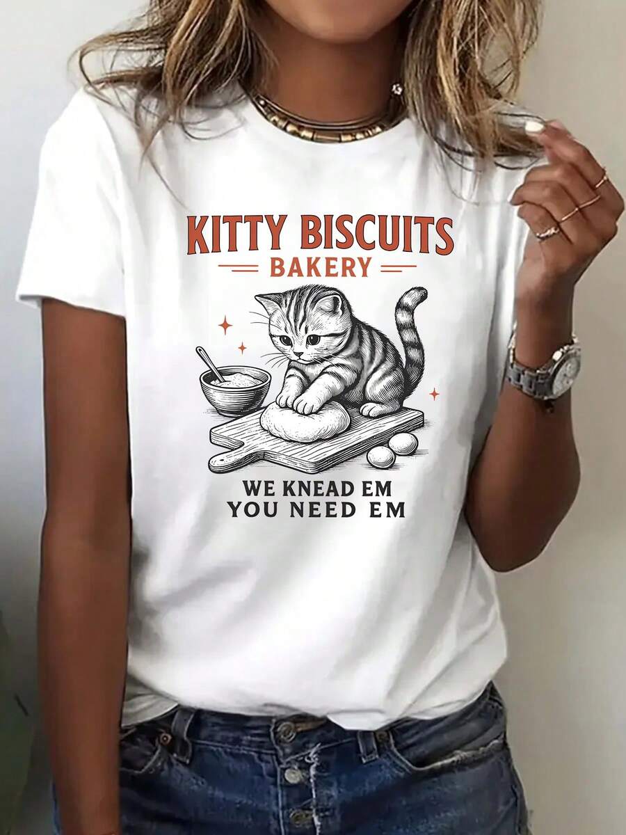 Women's "Kitty Biscuits Bakery" Feline Humor Graphic T-Shirt, Short Sleeve Crew Neck Top With Adorable Kitten Kneading Dough And The Witty Slogan "We Knead Em You Need Em" - Perfect Gift For Pet Clothing Fans And Fans Of Quirky Outfits - 白色 - 查看 1