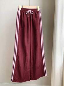 2026 Nuevo Pantalones deportivos casuales de mujer con raya lateral amarilla, cintura elástica y corte holgado, adecuados para primavera/verano, Navidad, Y2K, salidas casuales de Año Nuevo - Burdeos - Ver 4
