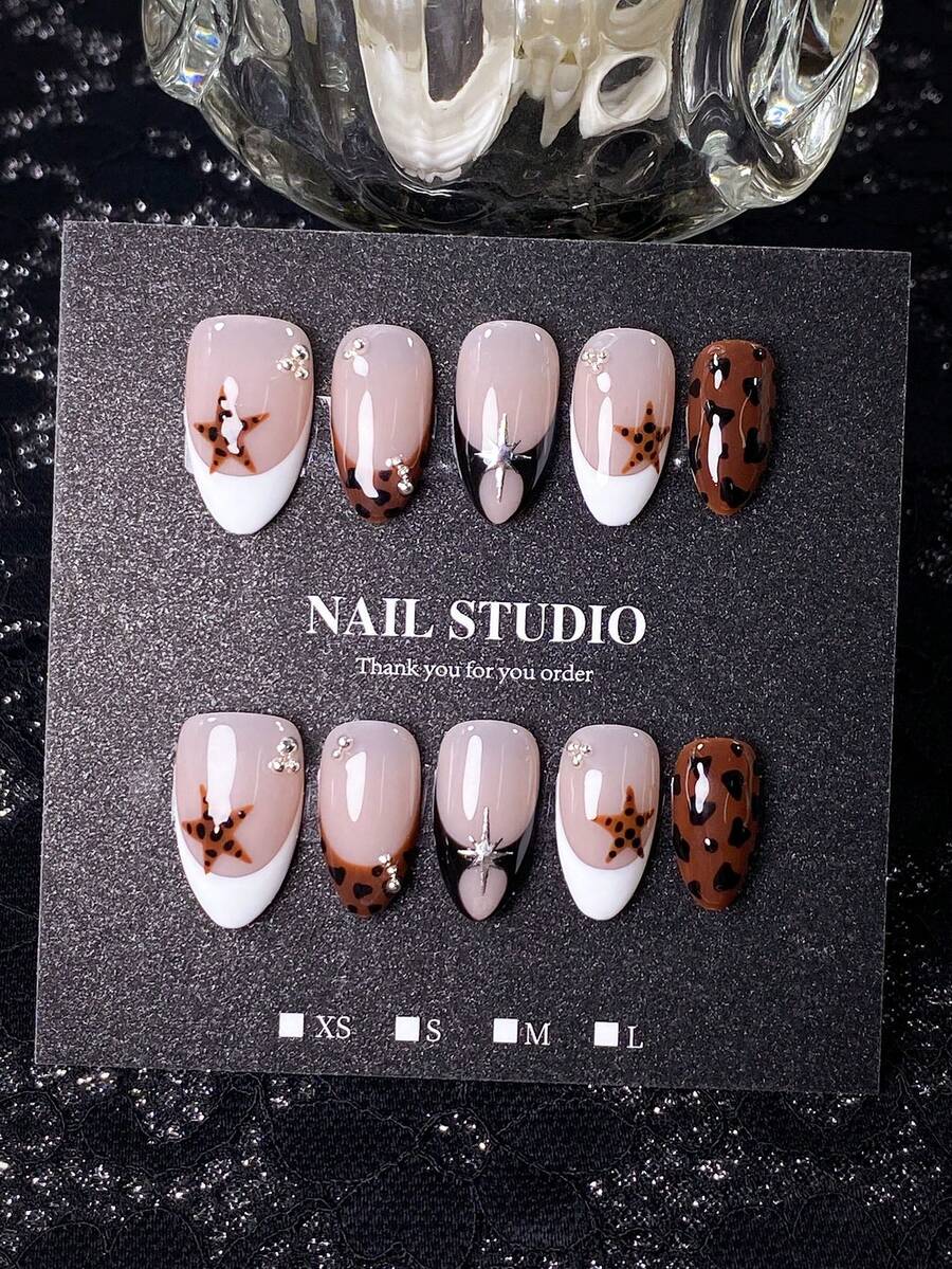10pcs Summer Handmade Short Almond-Shaped Nail Tips, Nude Pink Base Color, White/Brown/Black Contrast French Tips, Hand-Painted Leopard Print + Stars + Sunburst + Rhinestone Decor, Retro Chic Style, Versatile, Comes With Manicure Tool Kit, Quick Wear & Remove Short Almond Artificial Nails Suitable For All Occasions - Brown - View 1
