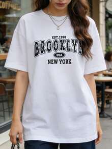 Maglietta estiva casual da donna con collo rotondo e maniche corte, stampa grafica vintage consumata Brooklyn New York USA EST.1998, adatta per uso quotidiano.Bianco - Bianco - Visualizzare 5
