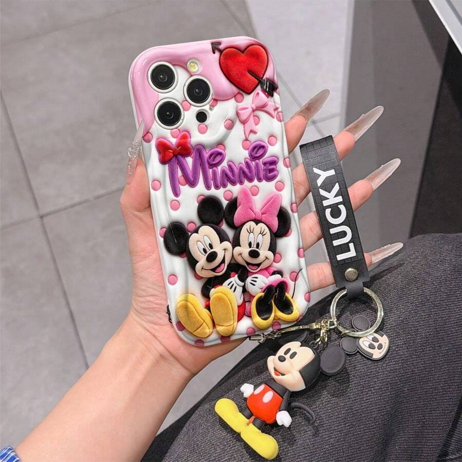 This Disney Mickey Mouse Lanyard Phone Case Is Fully Covered In TPU Material. It's Shockproof, Lightweight, And Compatible With IPhone17/16/11/13/15/15 Plus/15 Pro/15 Pro Max/12/14 Pro Max/11 Pro Max/12 Pro/12 Pro Max/13. This Phone Case Makes A Popular Birthday Gift Or Business Gift; It's Durable, Stain- And Fingerprint Resistant, And Suitable For Both Men And Women. The Set Also Includes A Mickey Mouse Phone Case And A Mickey Mouse Plush Bracelet. It's A Perfect Gift For Friends And Family. This Stylish Phone Case Is Fun, Lightweight, And Durable. IPhone17 Pro Max Phone Case, Minnie Mouse Phone Case. - trắng - Xem 1