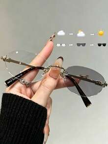 1件女款優雅藝術富家千金風橢圓無框金屬眼鏡 - 銀色(變灰片) - 查看 16