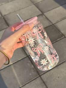 1個 Ins 熱門粉色蝴蝶結與雛菊吸管杯附蓋，防漏便攜水瓶，大容量透明咖啡果汁杯，極具吸引力的少女風設計，適合夏季冷飲、日常補水，學生與上班族使用，禮品或自用，派對杯，附蓋吸管杯，水瓶，隨行杯 - 查看 7