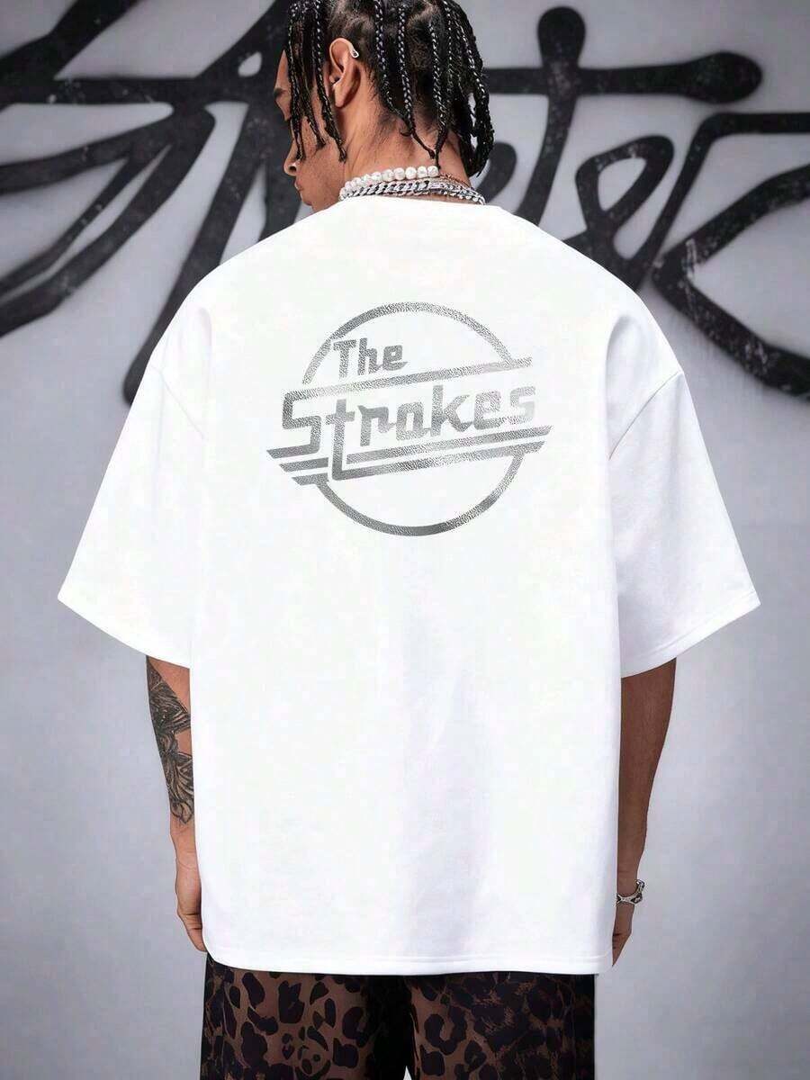 El icónico logo de The Strokes representa la esencia pura del rock  y su legado musical. Es un símbolo poderoso para los fans de la banda y su impacto cultural. Refleja una energía auténtica e identidad artística atemporal. camiseta de hombre 220g - Blanco - Ver 1