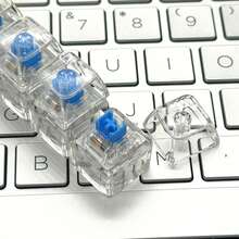 1 pieza Llavero de teclado mecánico con teclas transparentes de cuatro teclas, juguete antiestrés de teclado, accesorio colgante de alivio de estrés, regalo de llavero para mochila - transparente - Ver 9