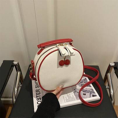 Bolso de mano moderno y versátil para mujer, estilo casual elegante con un toque de alta gama, bolso de hombro estiloso ideal para ir de compras, nuevo bolso redondo color cereza 2026 con colores contrastantes, bolso cruzado sencillo, diseño de lichi a la moda, regalo para el Día de San Valentín.