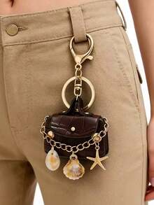 Mặt dây chuyền túi xách mini thời trang, móc khóa túi xách mini phong cách Boho đi biển, móc khóa da màu nâu với họa tiết vỏ sò và sao biển, móc khóa càng cua mạ vàng dành cho phụ nữ, bé gái và những người yêu thích mùa hè, phụ kiện túi xách mini dễ thương với điểm nhấn vỏ sò tự nhiên, phụ kiện hoàn hảo cho chìa khóa, ba lô, ví, túi xách và hành lý. - Nhiều màu - Xem 4