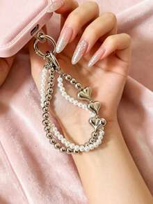 1 chiếc ốp điện thoại hình trái tim hai lớp mạ ngọc trai kèm dây đeo cổ tay, dây đeo chống thất lạc đính hạt bạc, phụ kiện ốp điện thoại và tai nghe đa năng. - Bạc - Xem 4
