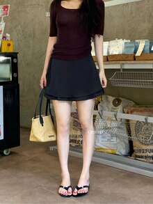 This Pink A-Line Mini Skirt (For Women) Is A Simple Satin Short Skirt With A Ribbon At The Hem, Offering A Casual Style. It Has Just The Right Amount Of Stretch, Making It Perfect For A Cute Summer Outfit. - Black - View 2
