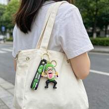 Miniso ONE PIECE Roronoa Zoro Dual Sword Character Bag Charm With Black Green Wrist Strap And Gold Clip For Backpack Handbag, Birthday Christmas Gift - Style 1 - View 3