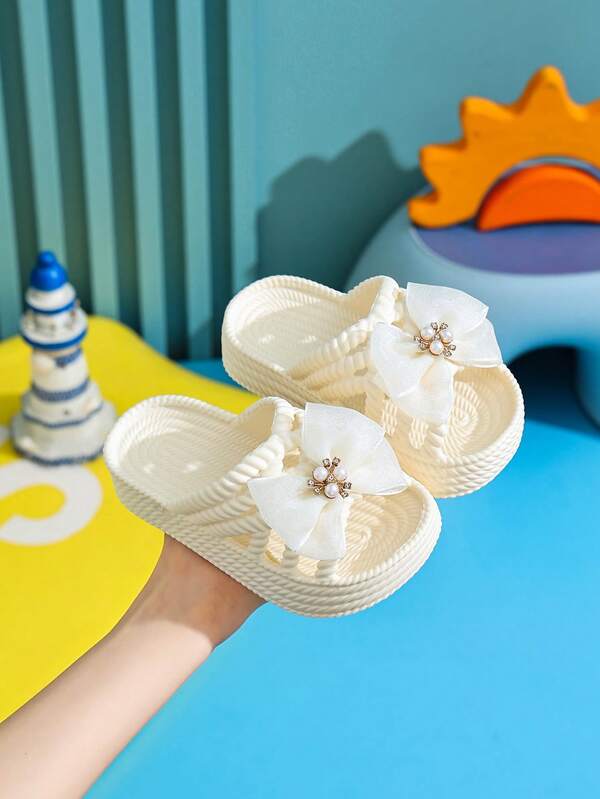 Sandal đế dày đính nơ ngọc trai cho bé gái, dép lê mùa hè mềm thoáng khí, phù hợp phong cách công chúa và đi biển