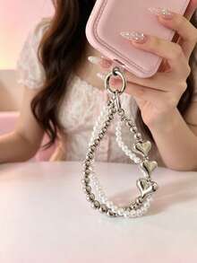1 chiếc ốp điện thoại hình trái tim hai lớp mạ ngọc trai kèm dây đeo cổ tay, dây đeo chống thất lạc đính hạt bạc, phụ kiện ốp điện thoại và tai nghe đa năng. - Bạc - Xem 2