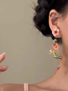 一对色彩缤纷的花朵流苏耳环,造型独特夸张,极其美丽甜美优雅,尽显奢华,适合假日、旅行、派对佩戴。 - 彩色的 - 查看 3