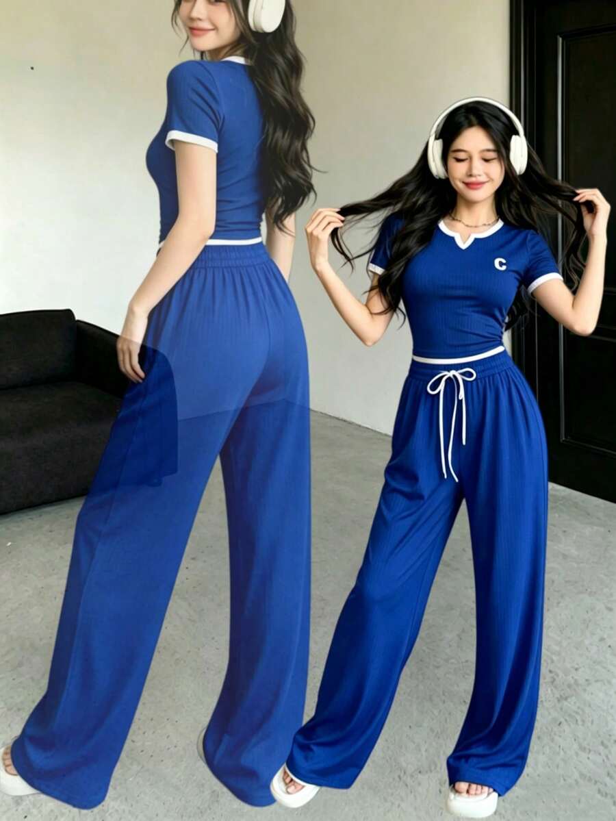 The Best Gift For Mother's Day: Women's 2-Piece Activewear Set With A Round Neck, Short-Sleeved Top, And Long Pants. A Minimalist, Solid-Color Short-Sleeved Top And Pants Set. Casual Outfit. - 藏蓝色 - 查看 1