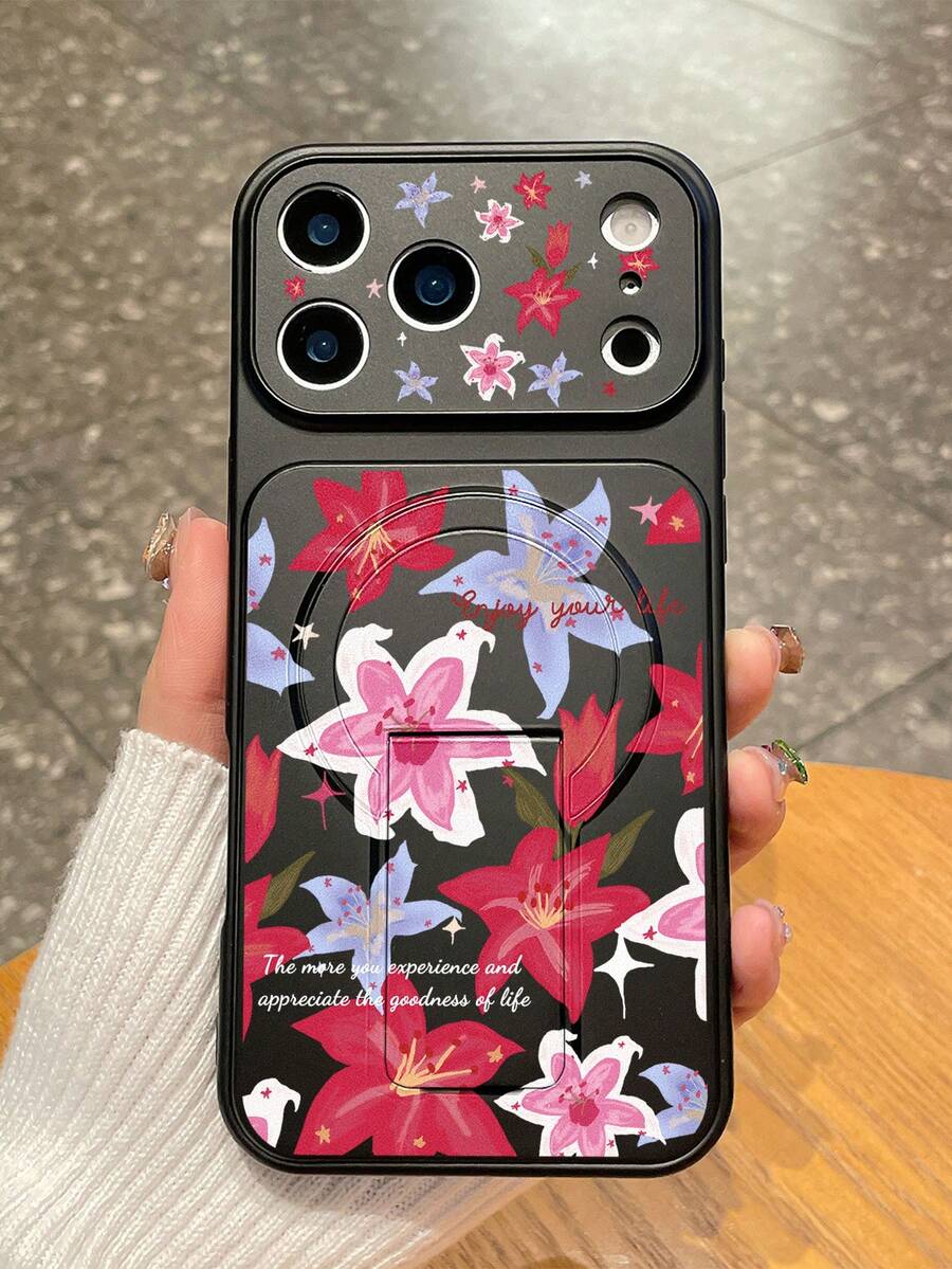 1pc Lily Floral Print Magnetic Stand Phone Case, Covers, "Enjoy Your Life" Slogan Design, Integrated Stand Black Matte Anti-Drop TPU Protective Cover, With Raised Camera Protection, Hands-Free For Watching Shows / Video Calls, Fresh Floral Style, Ideal For Daily Use Or Birthday / Valentine's Day Gift, Phone Accessories, Quick Ship, Compatible With IPhone Cases& Galaxy Cases, Compatible With Iphone 17 - Black - View 1